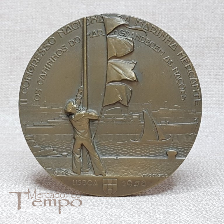 Medalha bronze, assinada João da Silva, alusiva ao II Congresso Nacional da Marinha Mercante, 1958. 
 