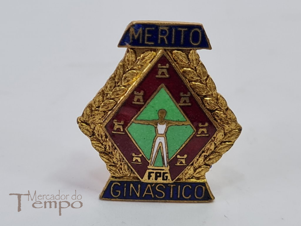 Pin esmaltado da Federação Portuguesa de Ginástica – Mérito Ginástico.