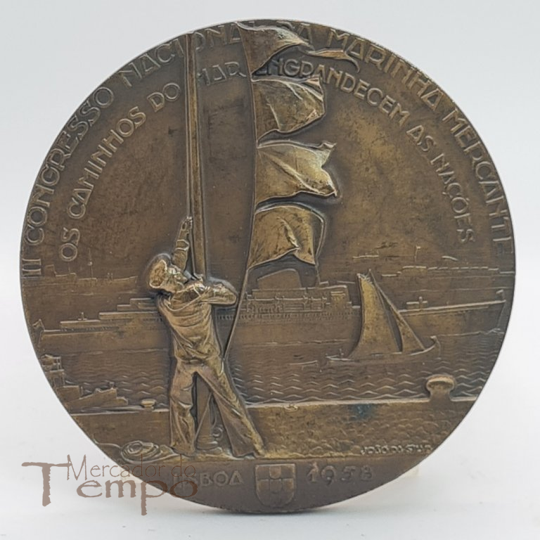 Medalha em bronze comemorativa do II Congresso Nacional da Marinha Mercante, datada de 1958. Assinada: João da Silva. 